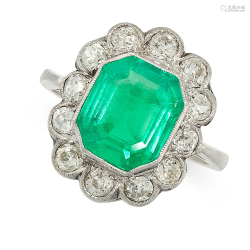 A FINE COLOMBIAN EMERALD AND DIAMOND RING set with an