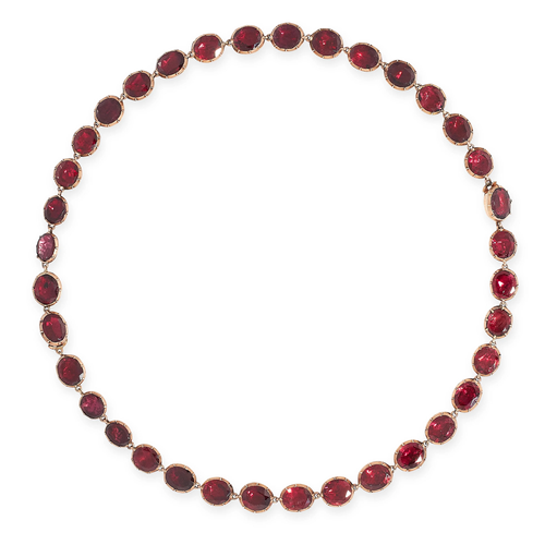 AN ANTIQUE GARNET RIVIERE NECKLACE, 19TH CENTURY in