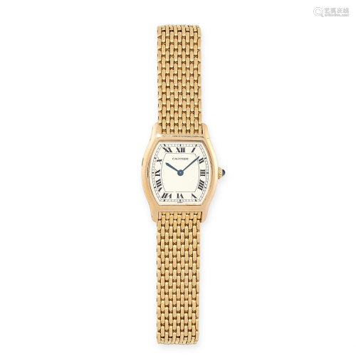 A TORTUE WRIST WATCH, CARTIER in 18ct yellow gold, 26mm