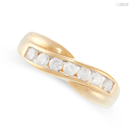 A DIAMOND CROSSOVER RING in 18ct yellow gold, the band