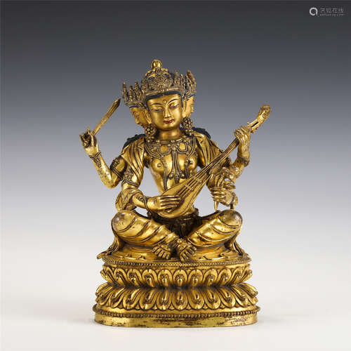 A CHINESE GILT BRONZE FIGURE OF BUDDHA SEATED STATUE