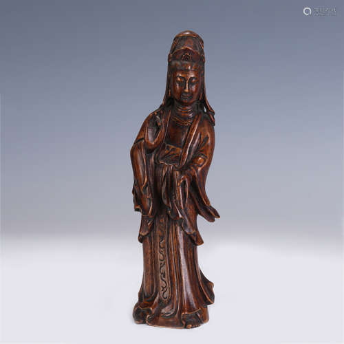 A CHINESE QING STYLE BOXWOOD FIGURE OF BUDDHA STANDING STATU...