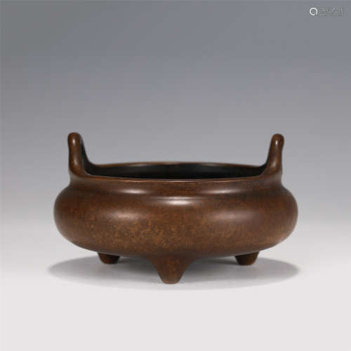 A CHINESE TRIPOD DOUBLE HANDLE BRONZE CENSER