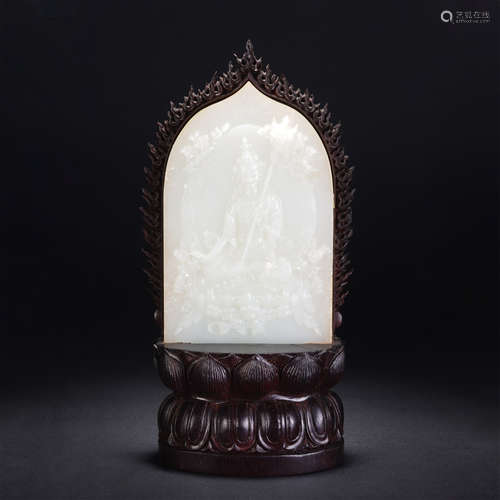 A CHINESE QING STYLE WHITE JADE FIGURE OF BUDDHA SEATED STAT...