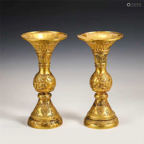 A PAIR OF CHINESE GILT BRONZE DRAGON PATTERN VASES