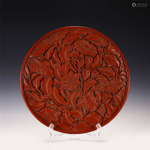 A CHINESE CARVED TIXI LACQUER PLATE