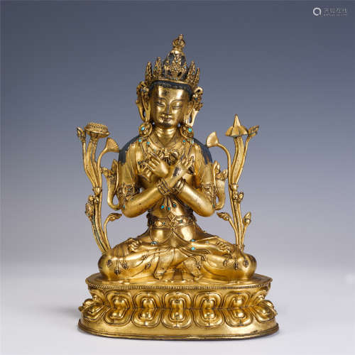 A CHINESE QING STYLE GILT BRONZE FIGURE OF BUDDHA SEATED STA...