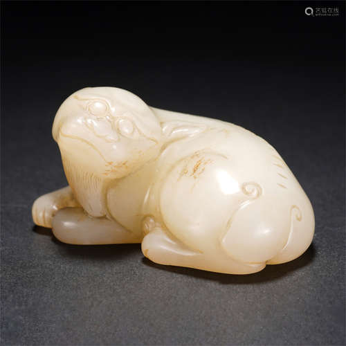 A CHINESE JADE AUSPICIOUS BEAST