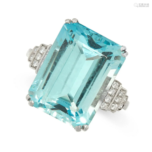 AN AQUAMARINE AND DIAMOND DRESS RING set with an