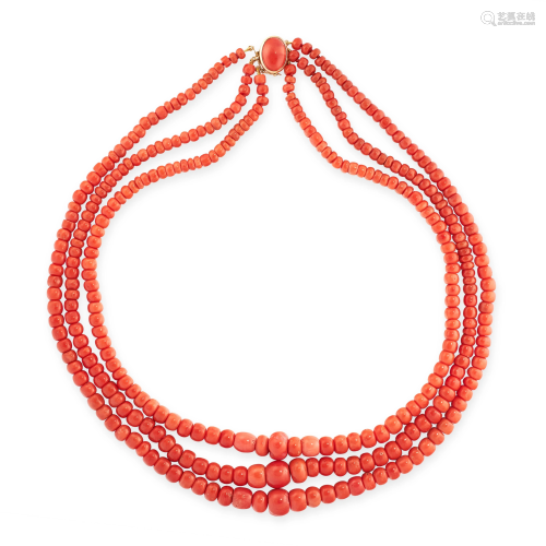 A CORAL BEAD NECKLACE in yellow gold, comprising three