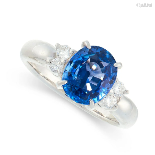 A SAPPHIRE AND DIAMOND RING set with a cushion shaped