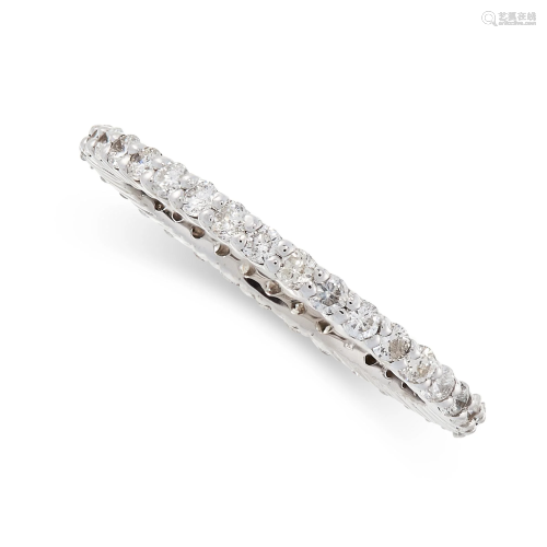 A DIAMOND ETERNITY RING set with a single row of round