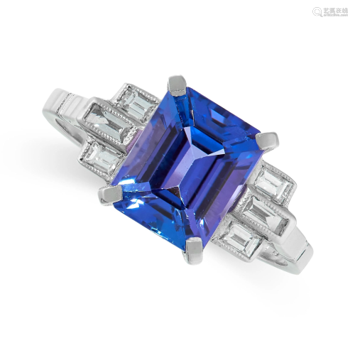 A TANZANITE AND DIAMOND RING in platinum, set with an