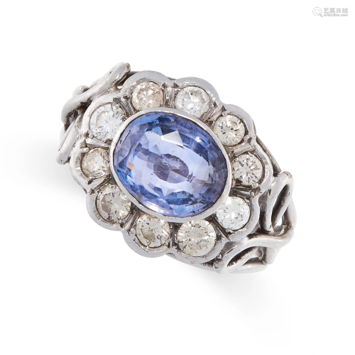 A SAPPHIRE AND DIAMOND RING in platinum and 18ct white