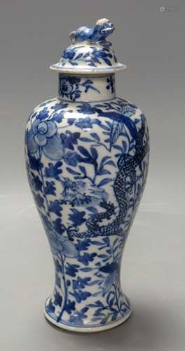 A 19th century Chinese blue and white dragon vase and cover,...