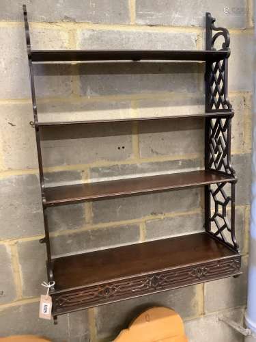 A George III mahogany fret cut four tier wall bracket, width...