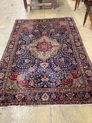 A North West Persian design blue ground carpet, 284 x 196cm