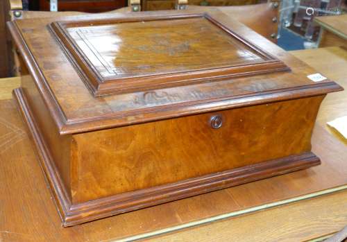A large Polyphon walnut table top musical box, playing thirt...