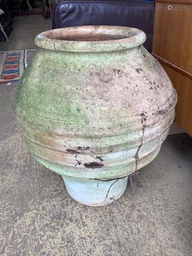 A circular Greek style earthenware garden planter, height 52...