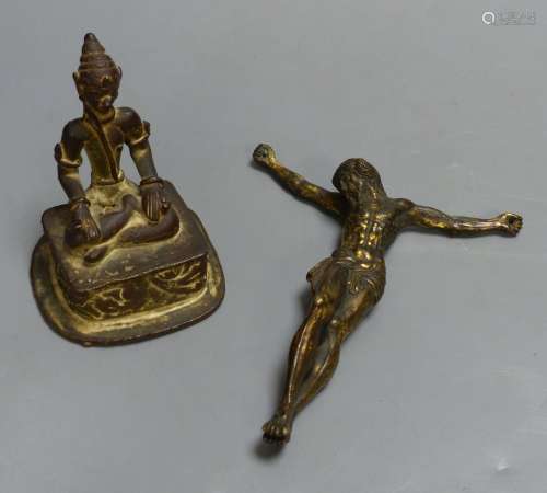 An Indian Buddhist figure and a gilt bronze Corpus Christi, ...