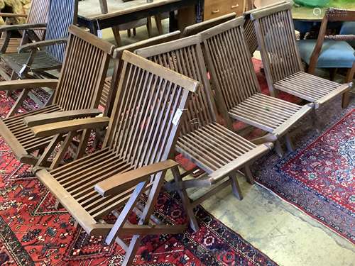 A set of eight teak folding garden chairs (two with arms)