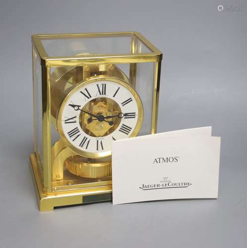 A Jaeger le Coultre Atmos mantel clock, with white enamelled...