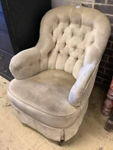 A Victorian upholstered spoon back rocking chair by Schoolbr...