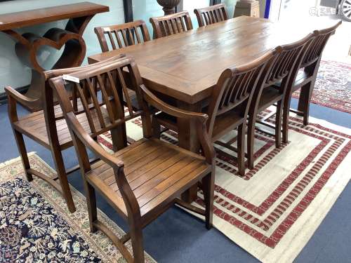 An 18th century style teak rectangular topped dining table, ...