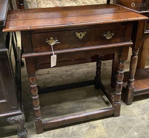 A 17th century style oak side tablefitted single drawer on b...