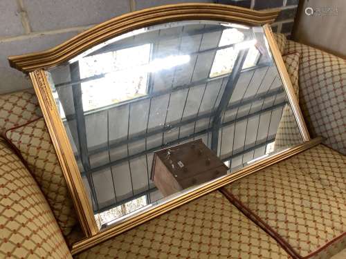 A reproduction gilt overmantel mirror, width 122cm, height 7...