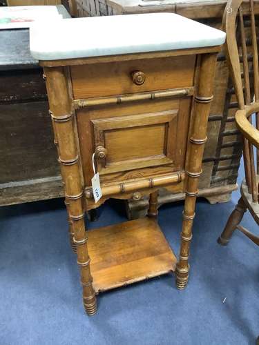 A Victorian pitch pine marble topped faux bamboo bedside cab...