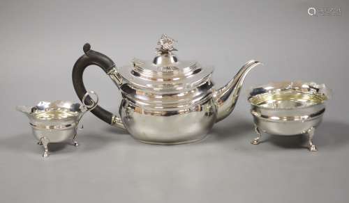 A George V silver teapot with floral finial, London, 1927 to...