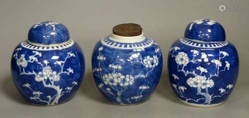 Three Chinese blue and white prunus jars, late 19th century/...