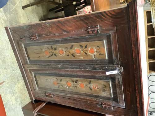 A 19th century Russian painted two door hanging cupboard, wi...