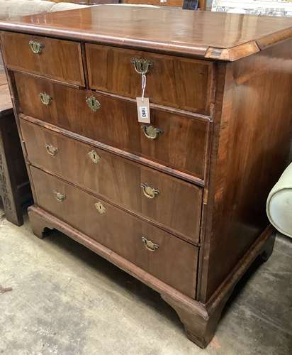 An 18th century feather banded walnut chest, width 94cm, dep...