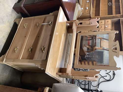 A late Victorian satin walnut dressing chest with swing mirr...