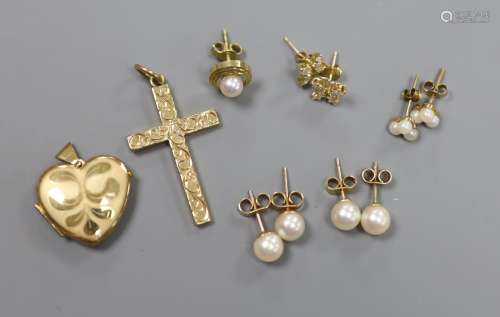 A 9ct gold cross pendant, three pairs of 9ct ear studs, one ...