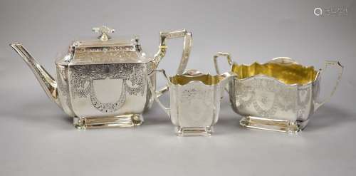 A silver three piece set, comprising teapot, twin-handled su...