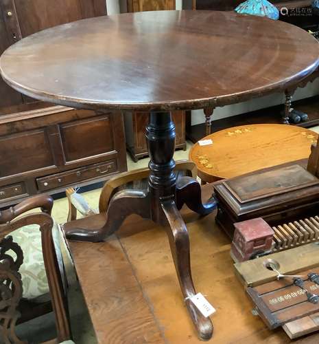 A George III and later circular mahogany tripod tea table, d...