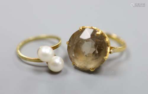 A yellow metal and smoky quartz dress ring, gross 8.2 grams ...