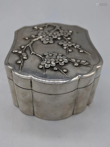 A Chinese export silver box, embossed with lotus, marks