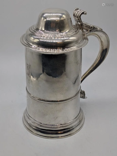 A George III silver tankard with lid, stag head crest,