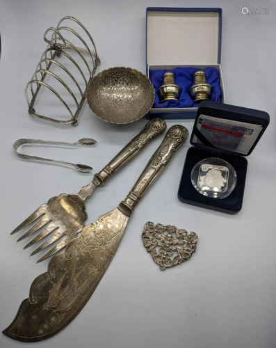 A collection of silver tableware to include a silver