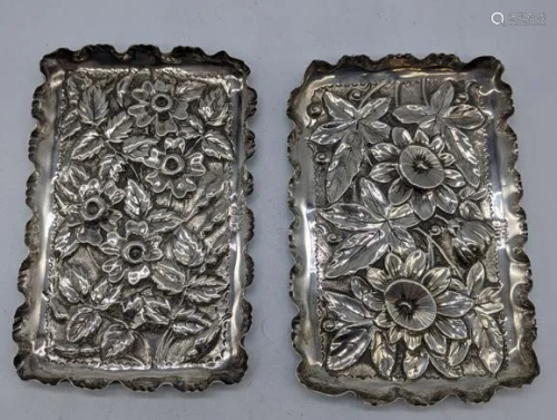 A pair of Victorian silver dishes, floral embossed