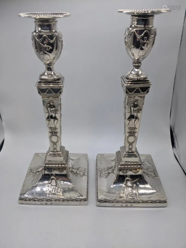 A pair of Edwardian silver candlesticks, hallmarked