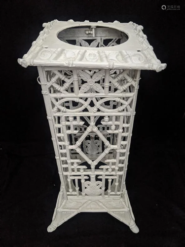 A white painted cast iron umbrella stand, chinoiserie