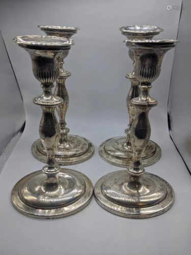A set of 4 George III silver candlesticks, hallmarked