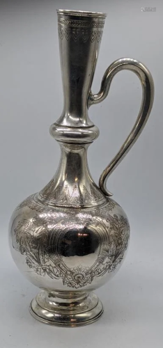 A late 19th century Russian silver wine ewer, etched