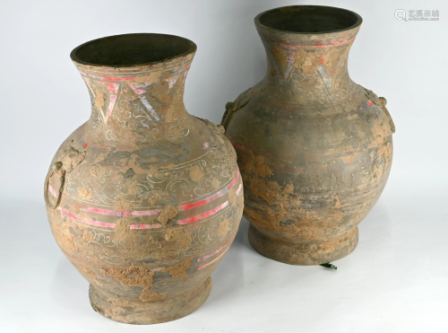 A pair of Chinese Han style Hu vases with taotie mask