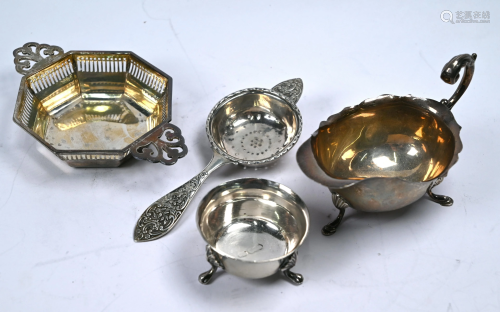 Silver tea strainer ,etc.